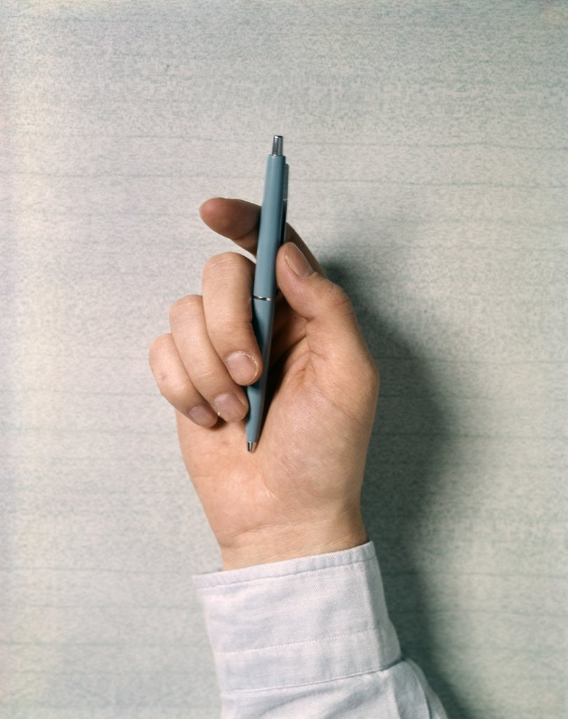 Detail of 1970s Male Hand Holding Ball Point Ink Pen by Anonymous