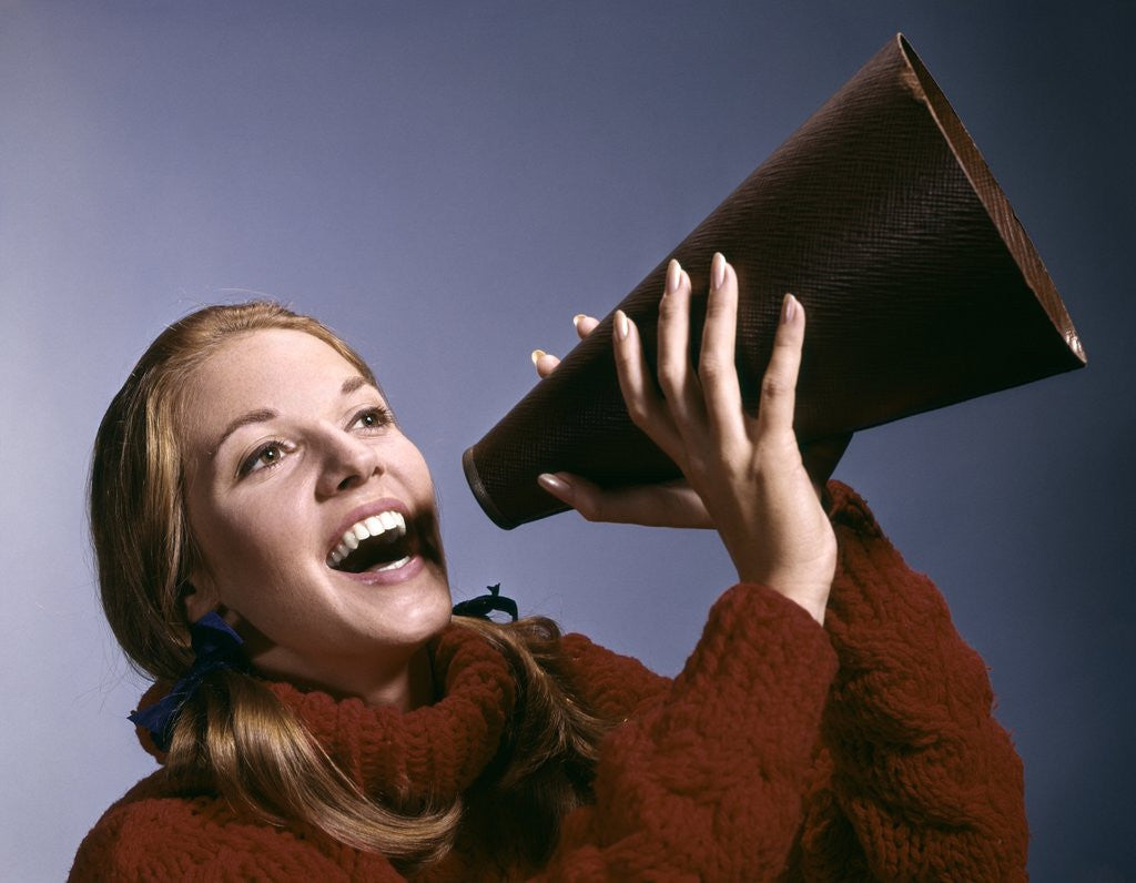 Detail of 1960s Portrait Teen Cheerleader Girl Shouting Into Megaphone by Anonymous