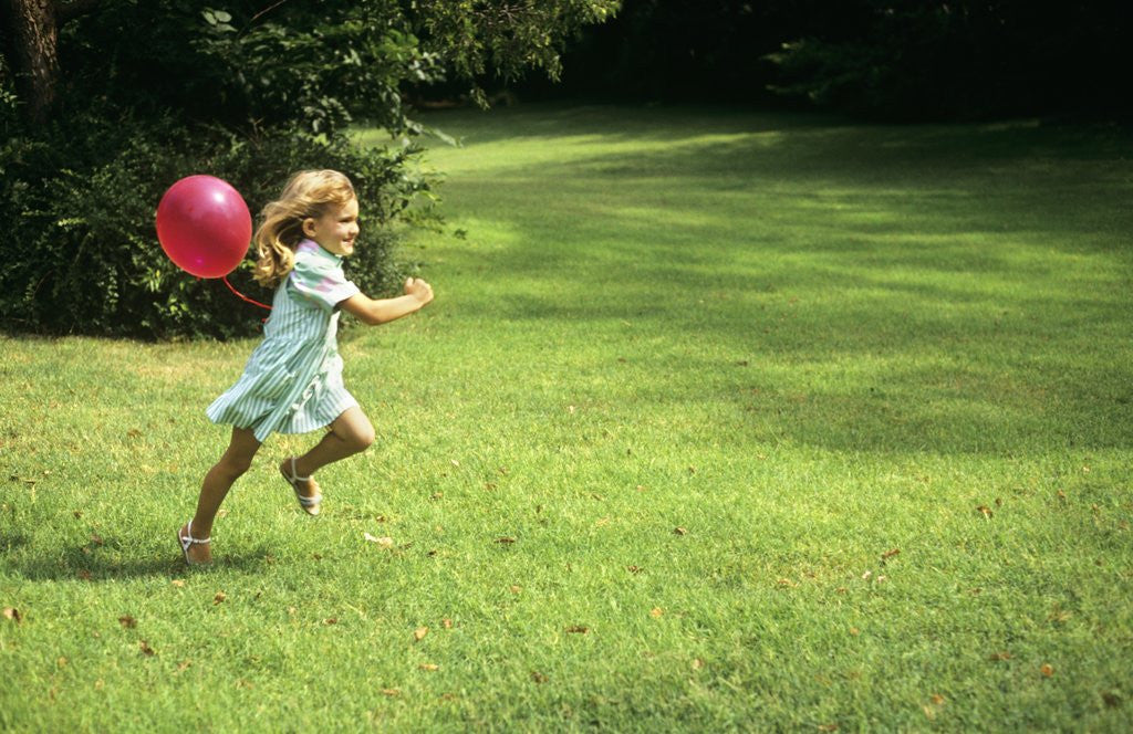 Detail of 1980s Little Girl With A Red Balloon Running In The Grass by Anonymous