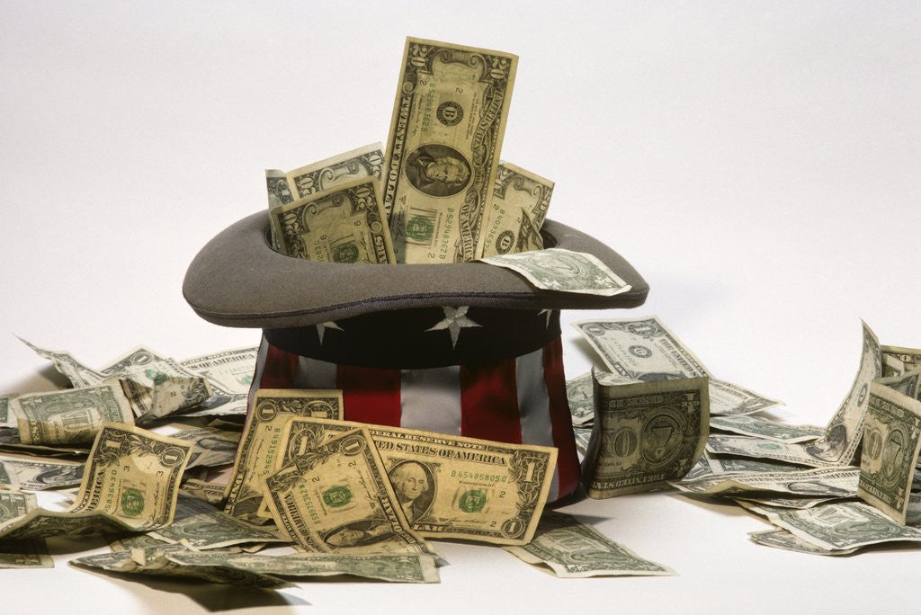Detail of 1990s Usa Currency And Uncle Sam Hat Symbolic Still Life by Corbis