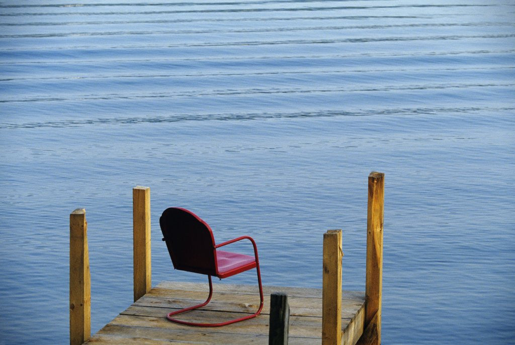 Detail of single Red Painter Metal Chair On End Of A Dock Lake George New York Usa by Anonymous