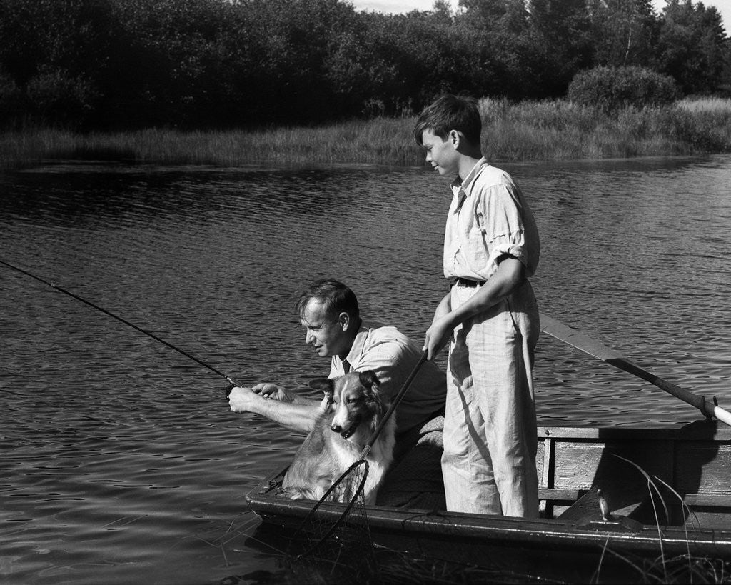 Detail of 1930s Man Father Teenage Boy Son Dog In Row Boat Fishing In Pond by Anonymous