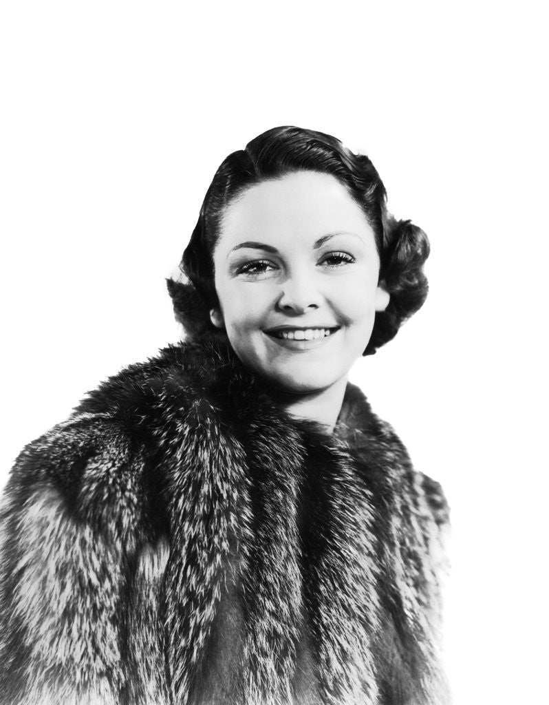 Detail of 1930s 1940s Portrait Smiling Woman Wearing Fur Coat Looking At Camera by Anonymous