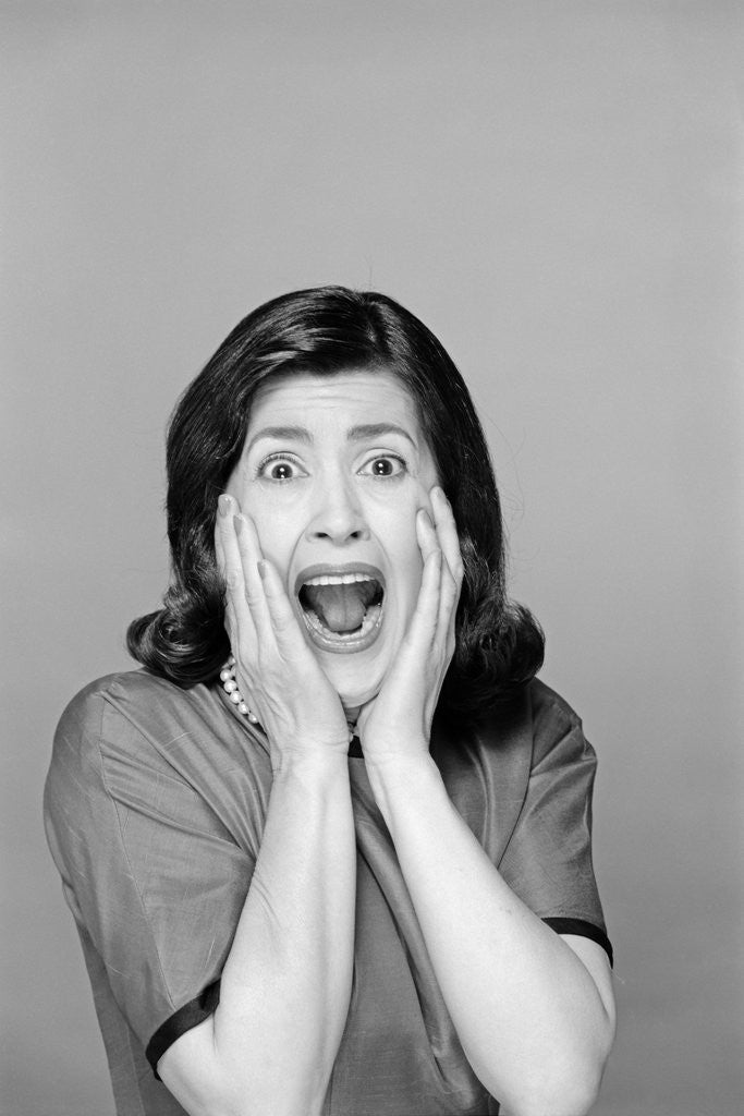 Detail of 1960s Brunette Woman Screaming Mouth Wide Open Hands To Face Facial Expression Fear Scream Surprise Character Funny Face by Corbis
