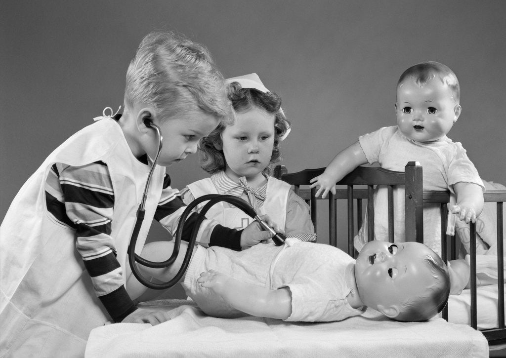Detail of 1950s Boy And Girl Playing Doctor And Nurse With Stethoscope And Dolls by Corbis