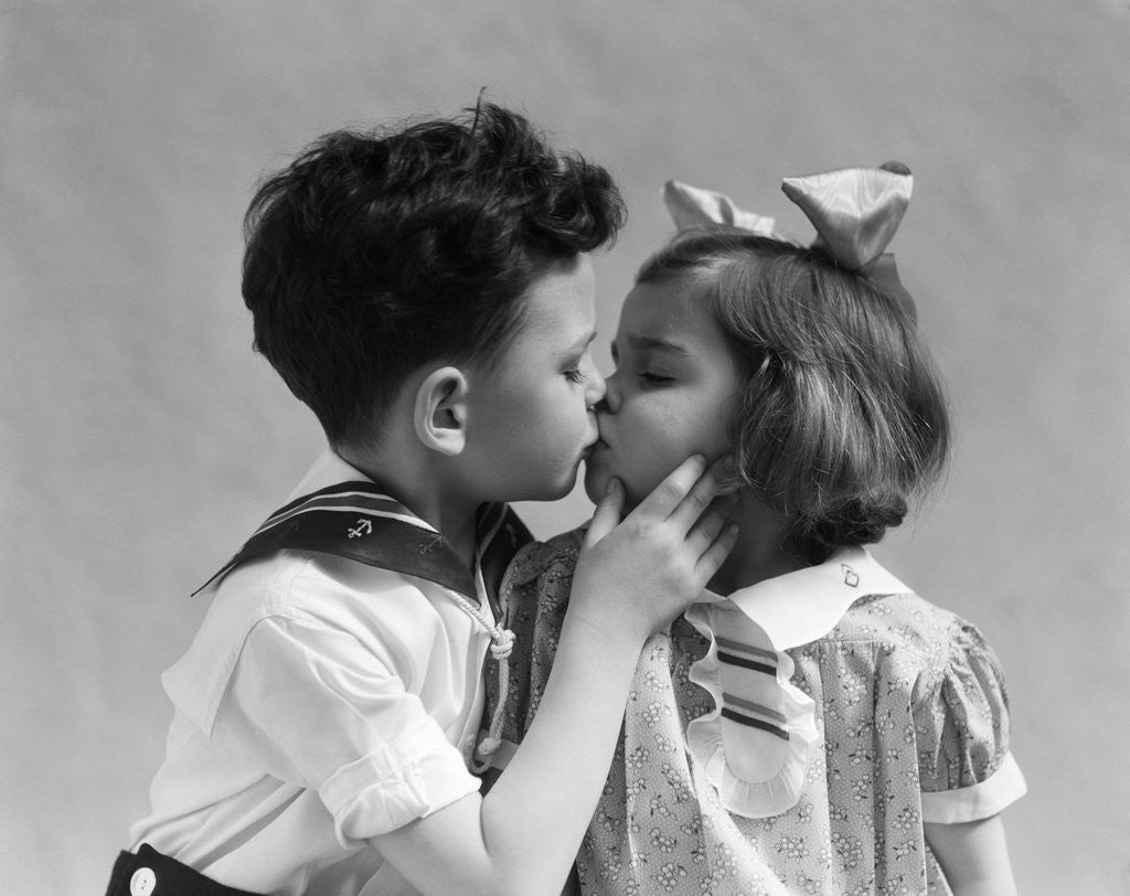 Detail of 1930s Two Children Young Boy And Girl Kissing by Anonymous
