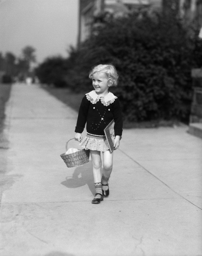 1940 Little Blond Girl Holding Basket Books Walking Sidewalk by Corbis