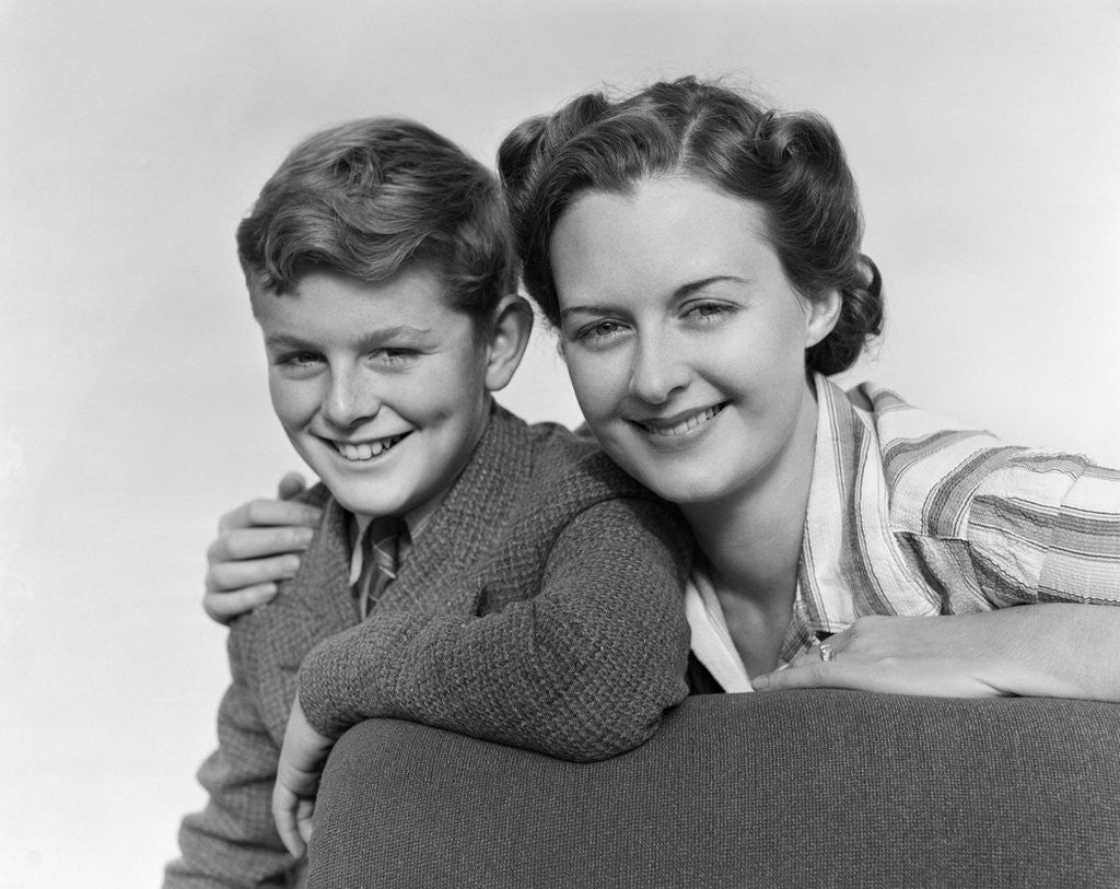 Detail of 1940s Portrait Woman Mother Hugging Boy Son Smiling Looking At Camera by Anonymous