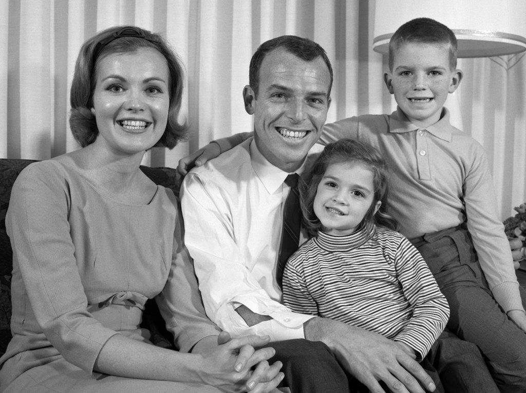 Detail of 1960s Smiling Family Portrait Mother Father Son Daughter Looking At Camera by Anonymous