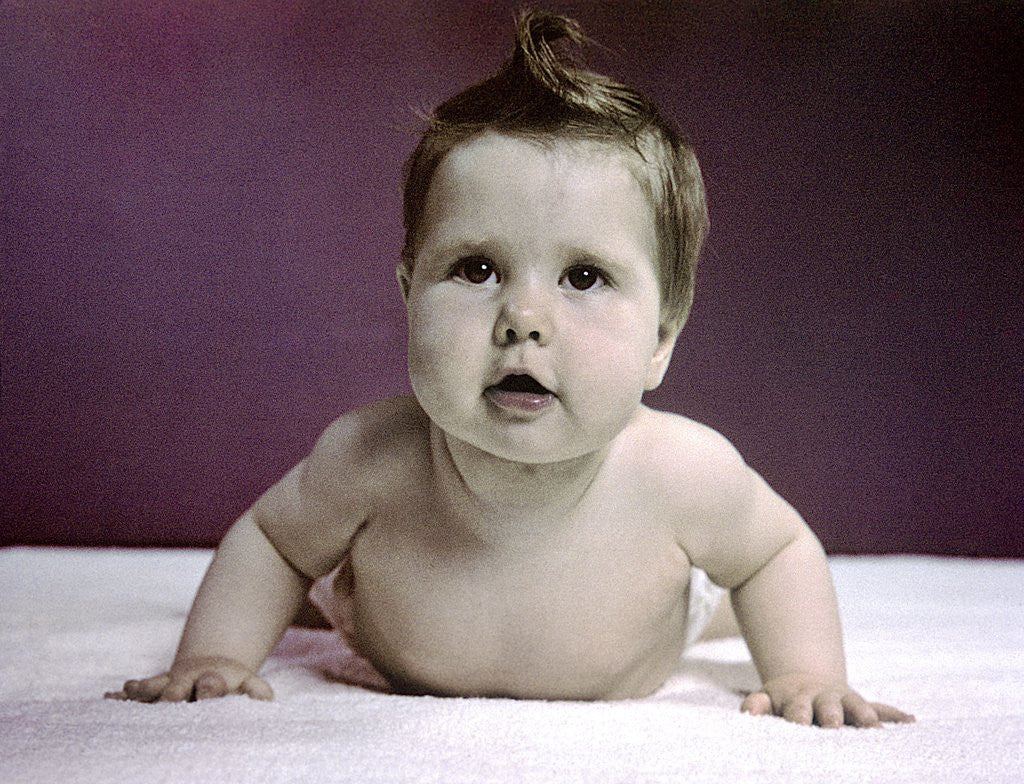 Detail of 1940s 1950s Baby Raising Head Up Pushing With Arms Like Push Up Exercise by Corbis