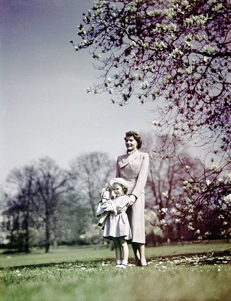 Detail of 1940s Woman Mother Girl Daughter Standing In Blossoming Spring Landscape by Anonymous