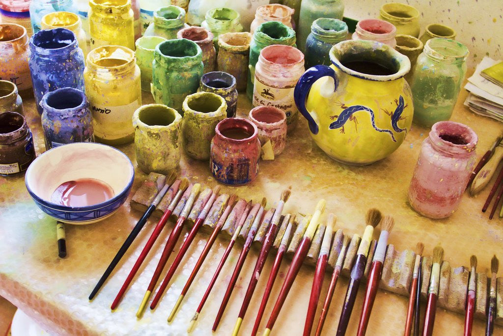 Detail of Paint brushes and colored paints by Anonymous