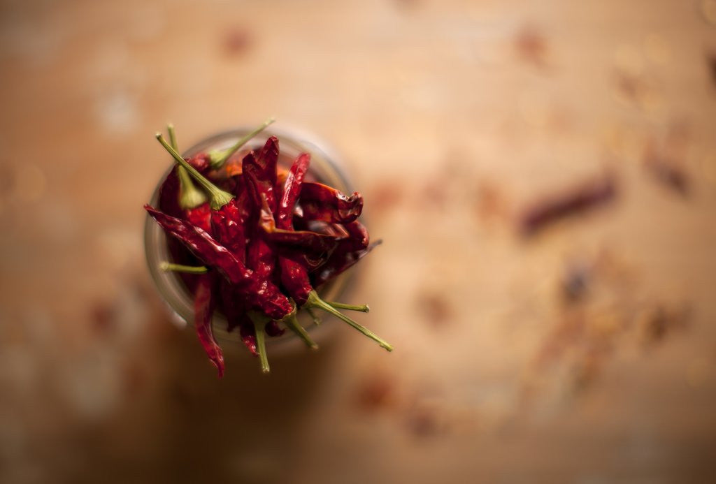 Detail of Dried red chillies in a mason jar by Anonymous