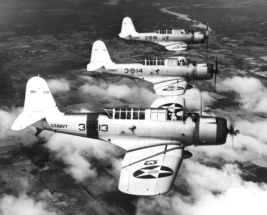 Detail of 1940s three World War II US navy dive bombers flying in formation by Corbis