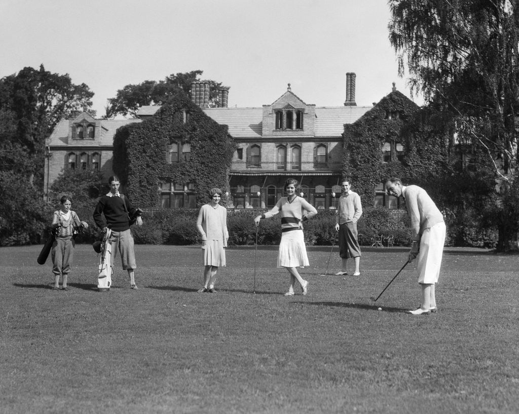 Detail of 1920s two women and four men playing golf by Anonymous