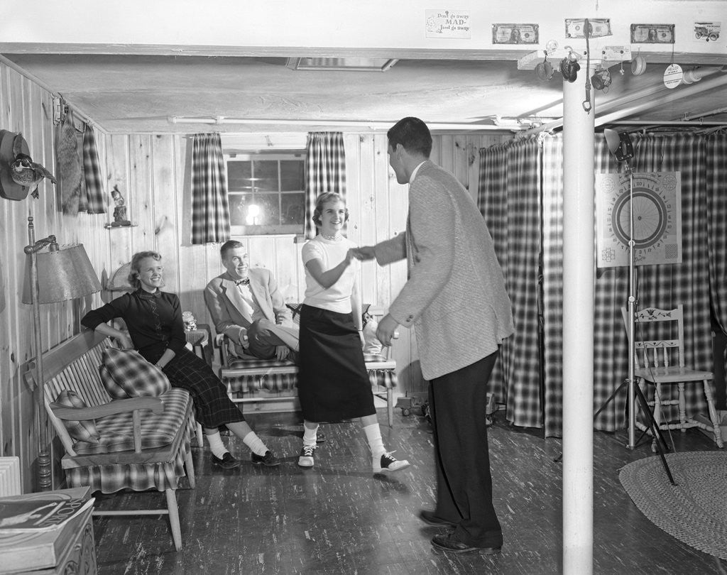 Detail of 1950s teens in rec room dancing by Anonymous