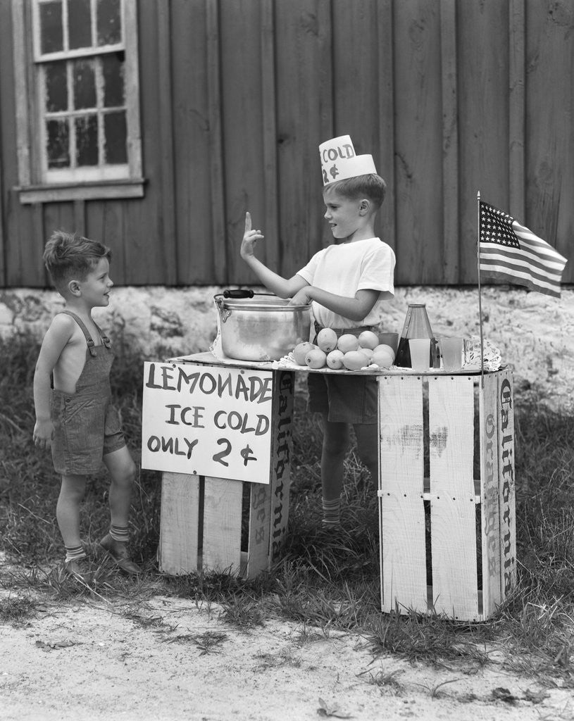Detail of 1940s boy running lemonade stand by Corbis