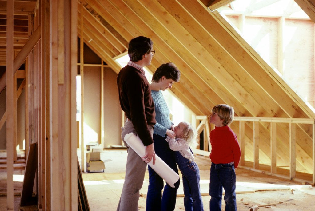 Detail of 1980s family of four inspecting new home under construction by Anonymous