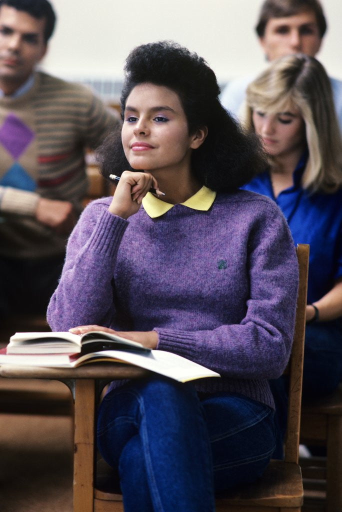 Detail of 1980s college classroom students sitting at desks by Anonymous