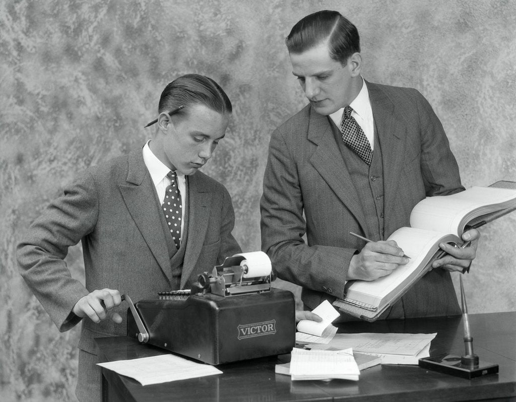 Detail of 1920s bookkeeper and young assistant by Anonymous