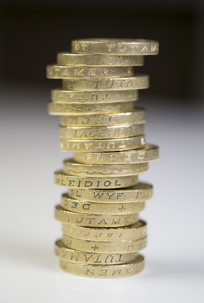 Detail of A pile of pound coins on a table by Anonymous