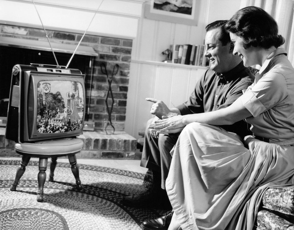 Detail of 1950s couple watching television by Anonymous