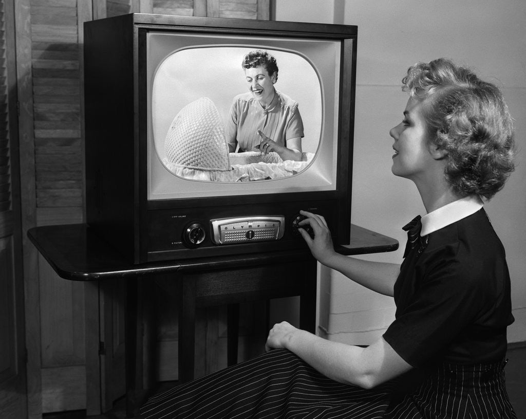 Detail of 1950s woman watching tv program about child care by Anonymous