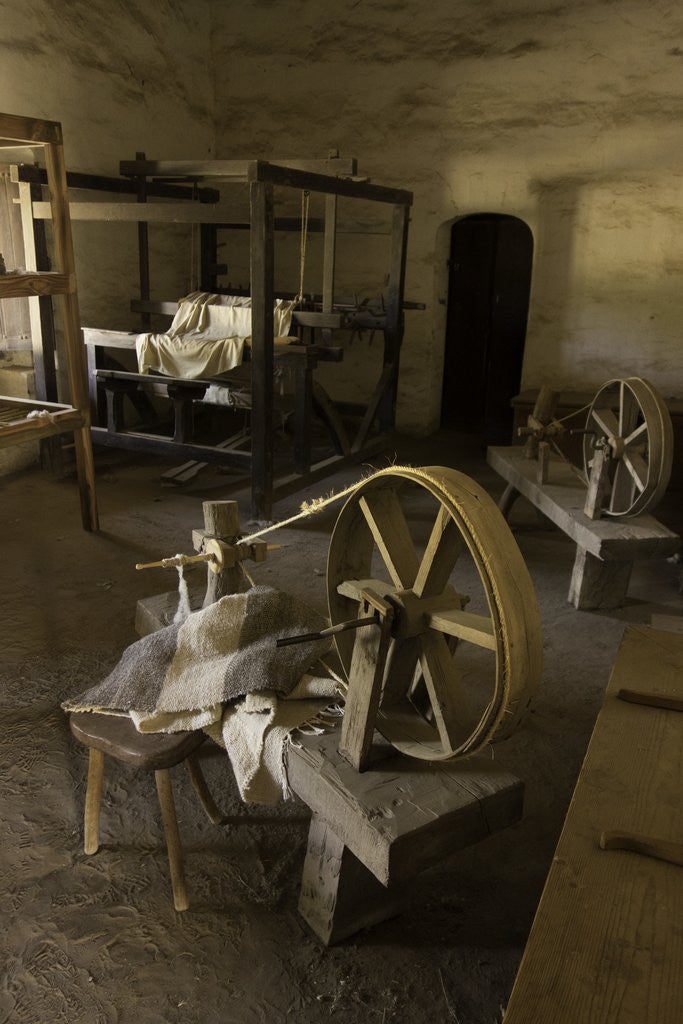 Detail of Spinning wheel and looms at La Purisima Mission in Lompoc California by Corbis