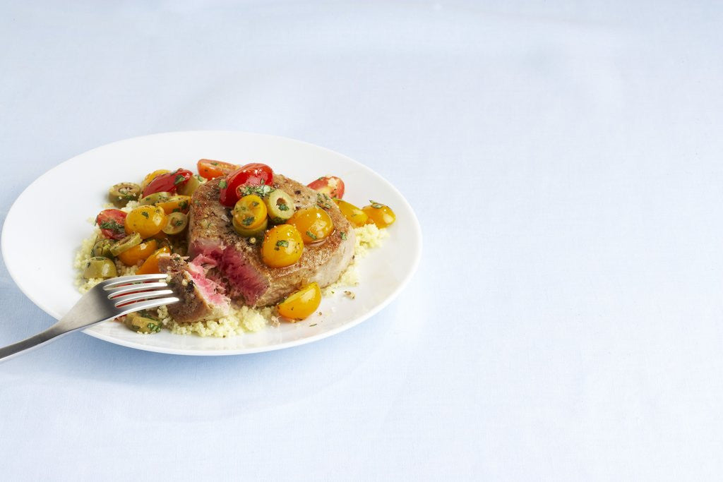 Detail of Tuna steak with tomato salad by Anonymous