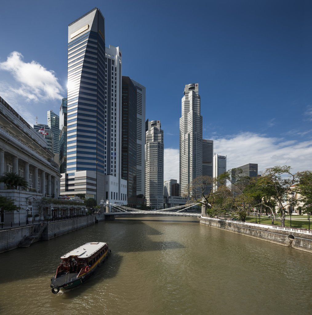 Detail of Boat on the Singapore river, the Cavenagh Bridge and the downtown by Anonymous