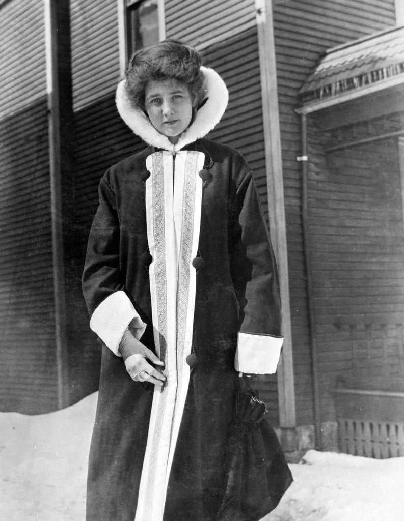 Detail of Young woman in winter clothing in Michigan, ca. 1912. by Anonymous