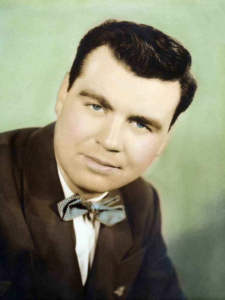 Detail of Mature man colorized studio portrait, ca. 1955. by Anonymous
