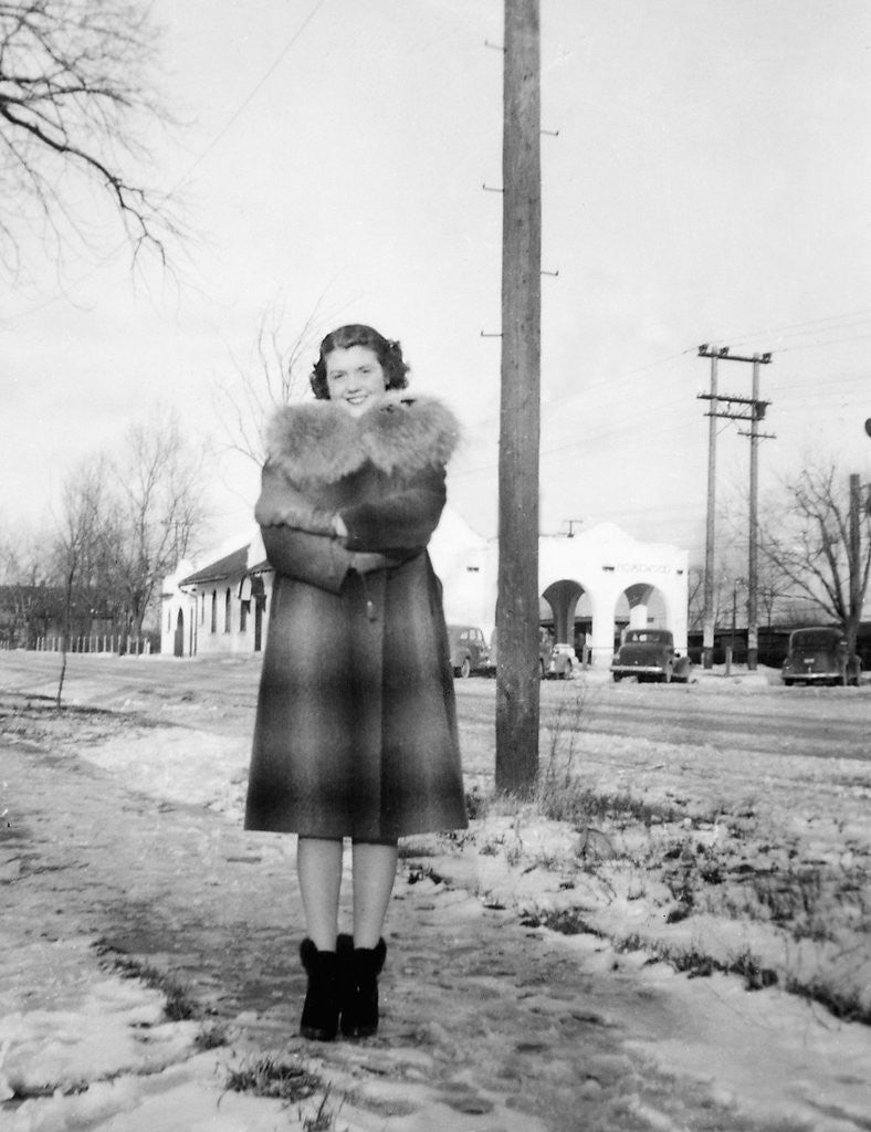 Detail of Young woman poses on street in Illinois, ca. 1940. by Anonymous