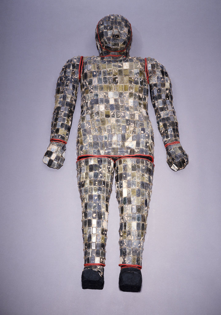 Detail of An important archaic spinach green and yellow nephrite jade burial suit assembled in ten sections by Anonymous