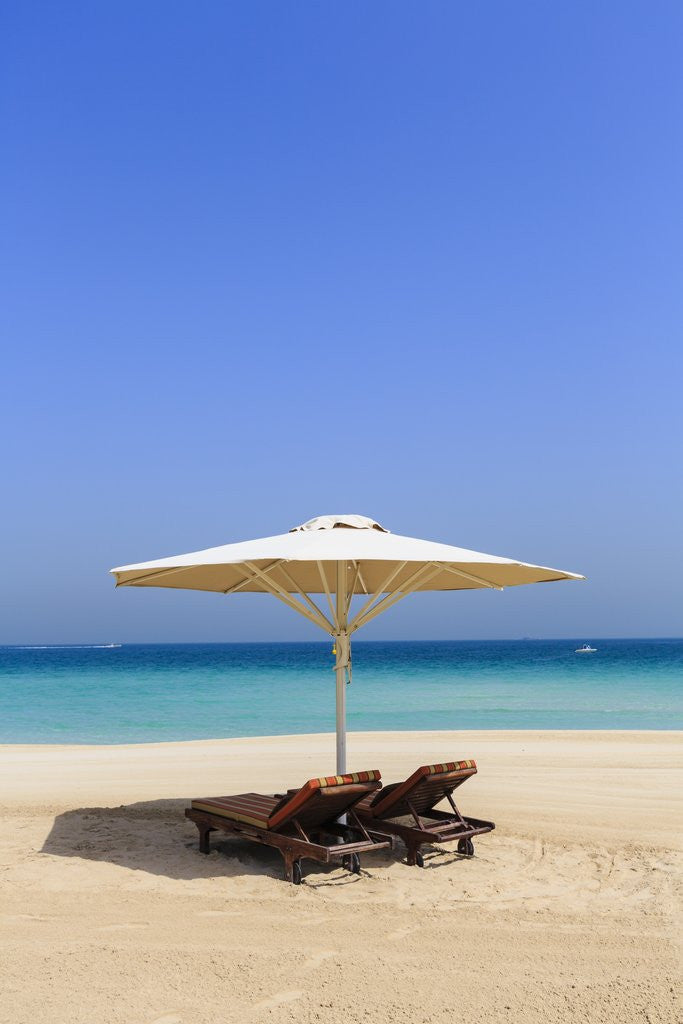 Detail of Parasol and recliner on the beach, Dubai by Anonymous