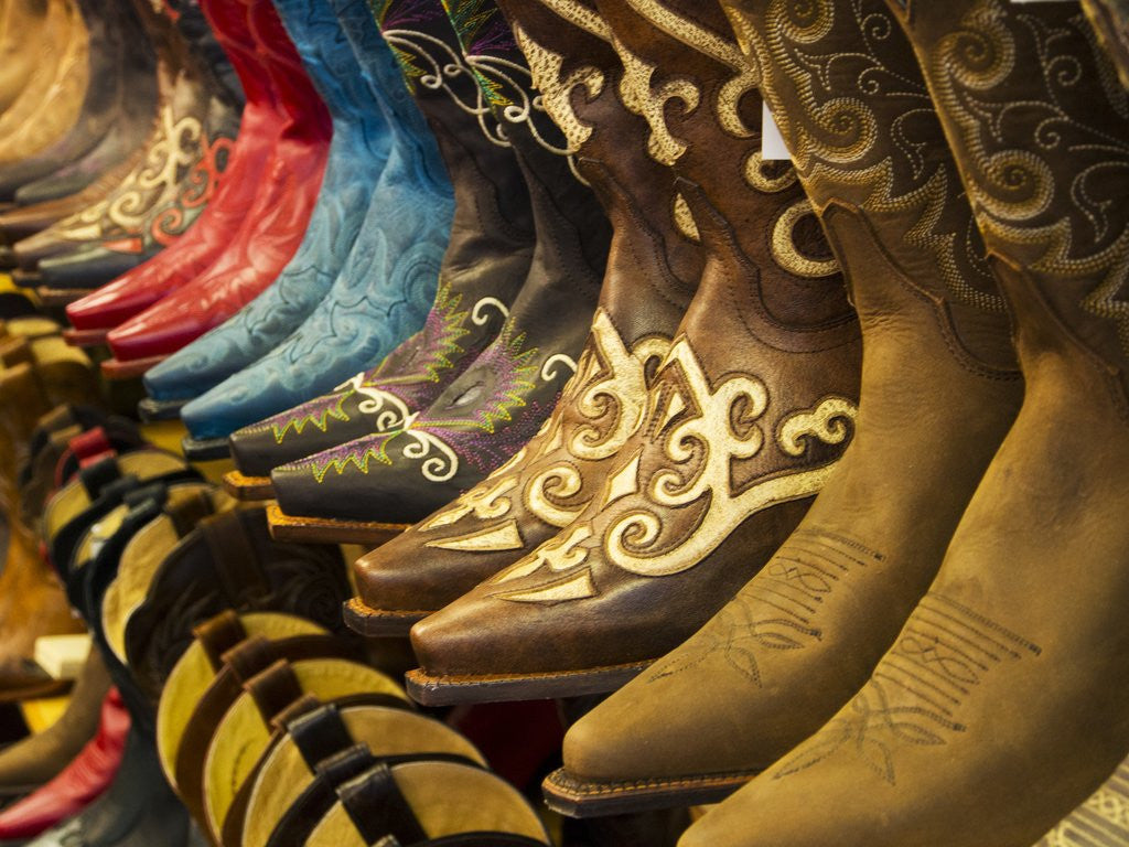 Detail of Line up of new cowboy boots in Old Scottsdale by Anonymous