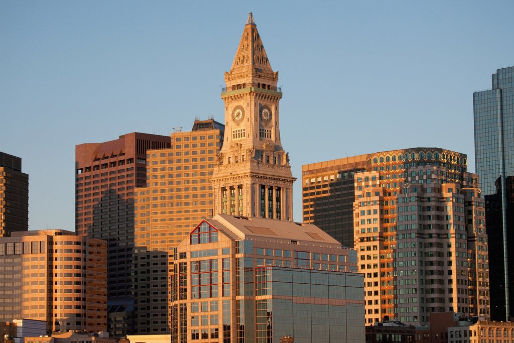 Detail of Boston Skyline at sunrise features Commerce House Tower, Boston, MA. by Corbis