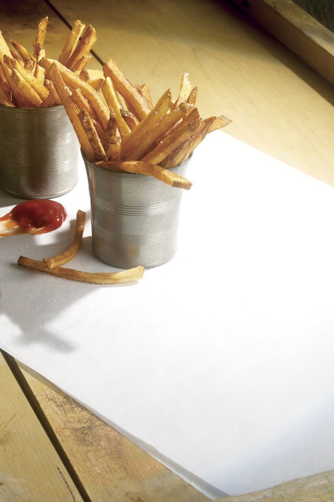 Detail of French fries with ketchup by Anonymous