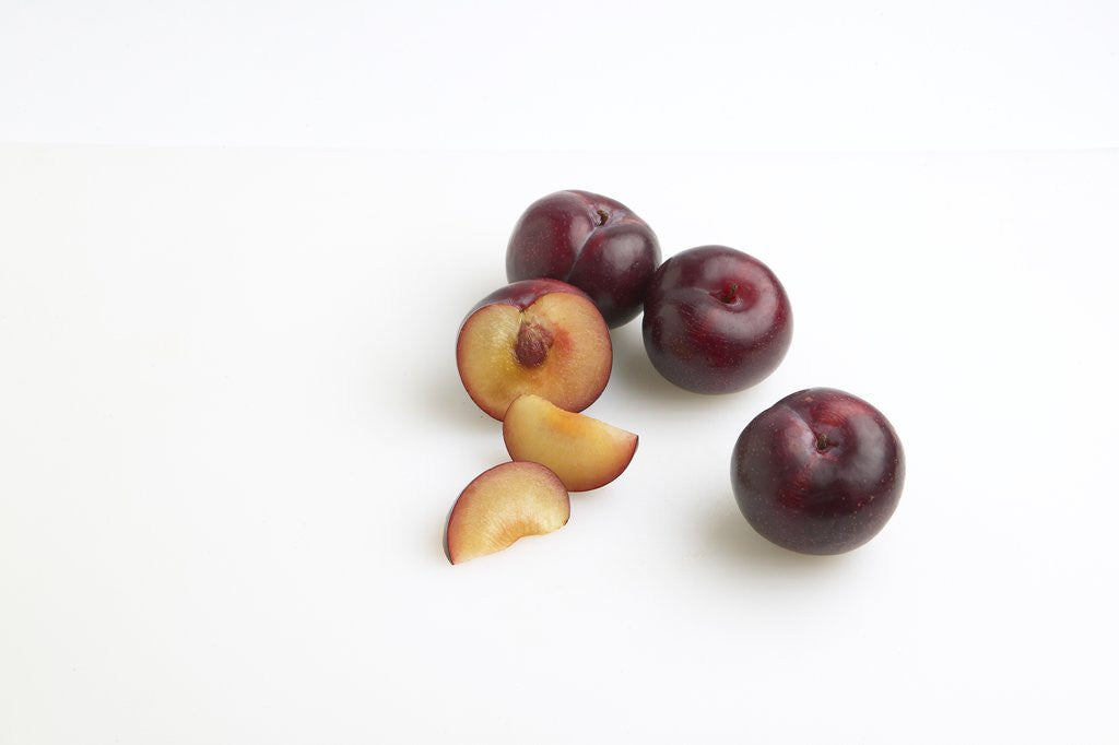 Detail of Sliced plums by Anonymous