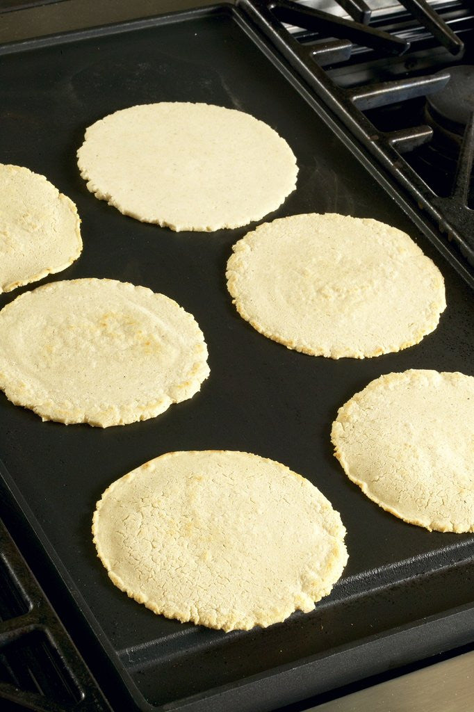Detail of Cooking corn tortillas by Anonymous
