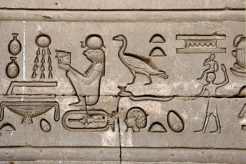 Detail of Ancient Egyptian hieroglyphs carved on the wall of Hathor Temple by Anonymous