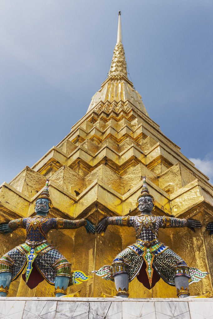 Detail of Grand Palace Complex, Wat Phra Kaew Temple (Temple of the Emerald Buddha), demon guardians and a Golden Chedi (stupa) by Anonymous