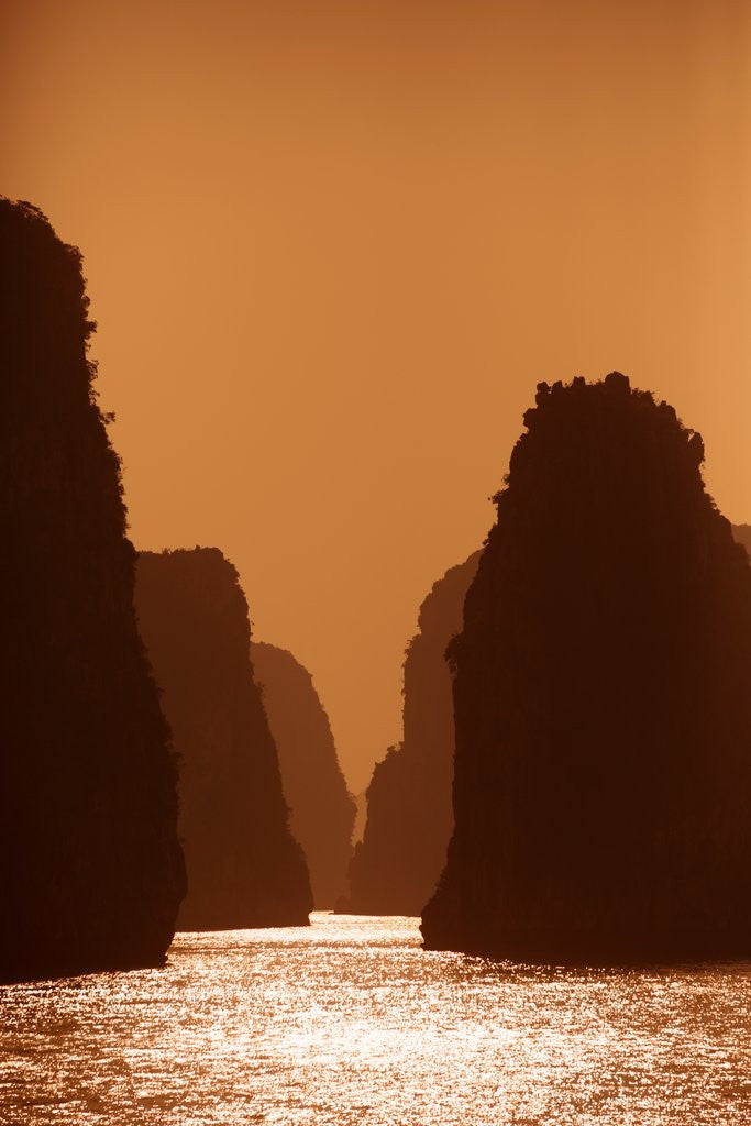Detail of Karst formations at sunset in Bai Tu Long Bay in Halong Bay UNESCO World Heritage Site, Vietnam by Anonymous