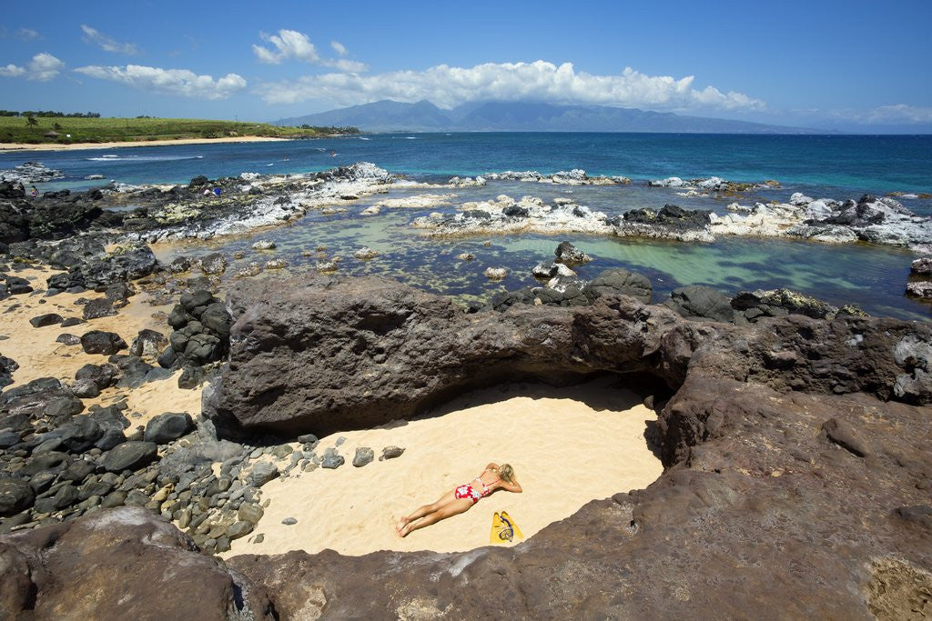 Detail of Woman sunbathing in secluded area of sand, Ho'okipa Beach Park, Maui, Hawaii MR by Anonymous