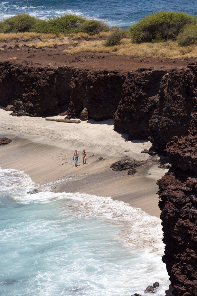 Detail of Couple walking on secluded beach at Shark's cove, Lanai, Hawaii MR by Anonymous
