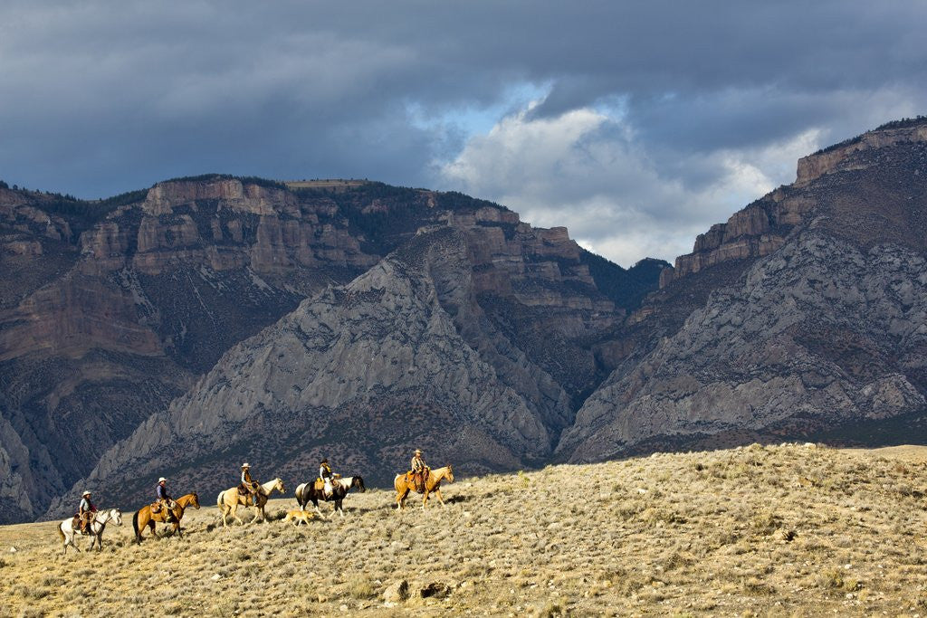 Detail of Cowboys and Cowgirls riding along the hills of the Big Horn Mountains by Anonymous