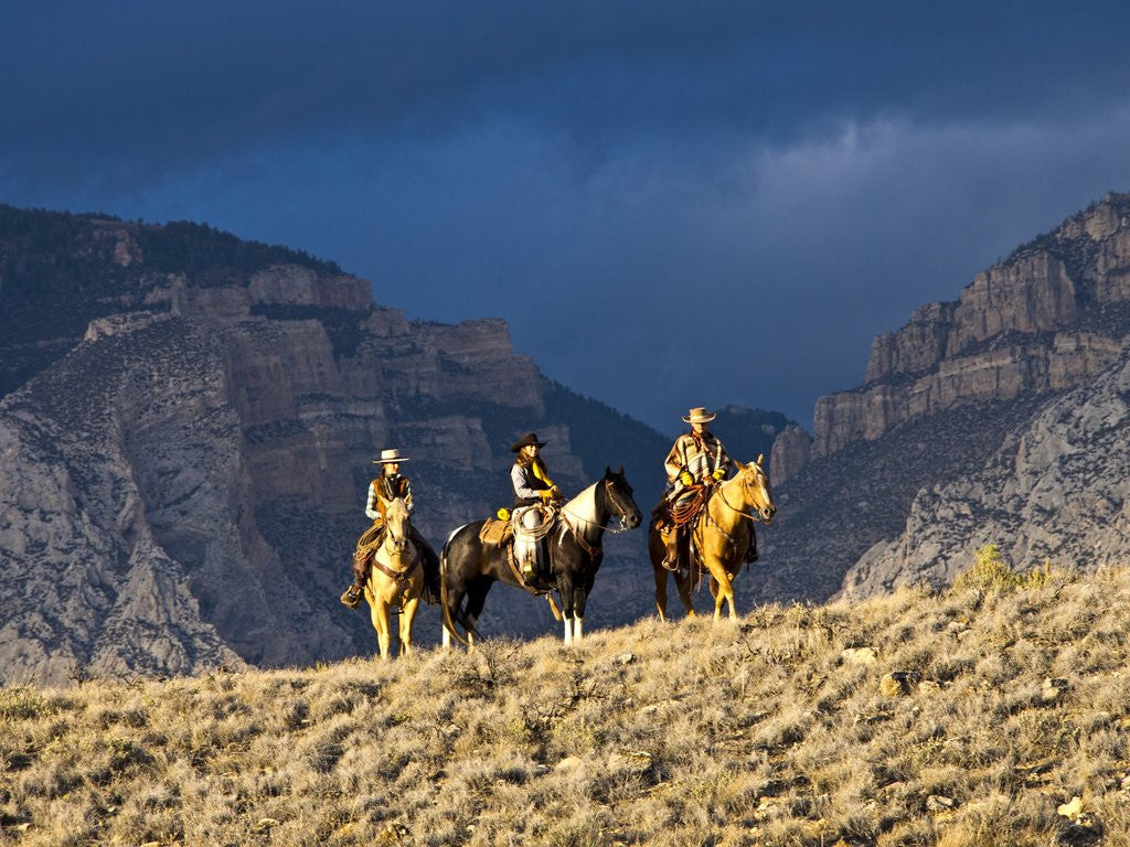 Detail of Cowboys and Cowgirls riding along the hills of the Big Horn Mountains by Anonymous