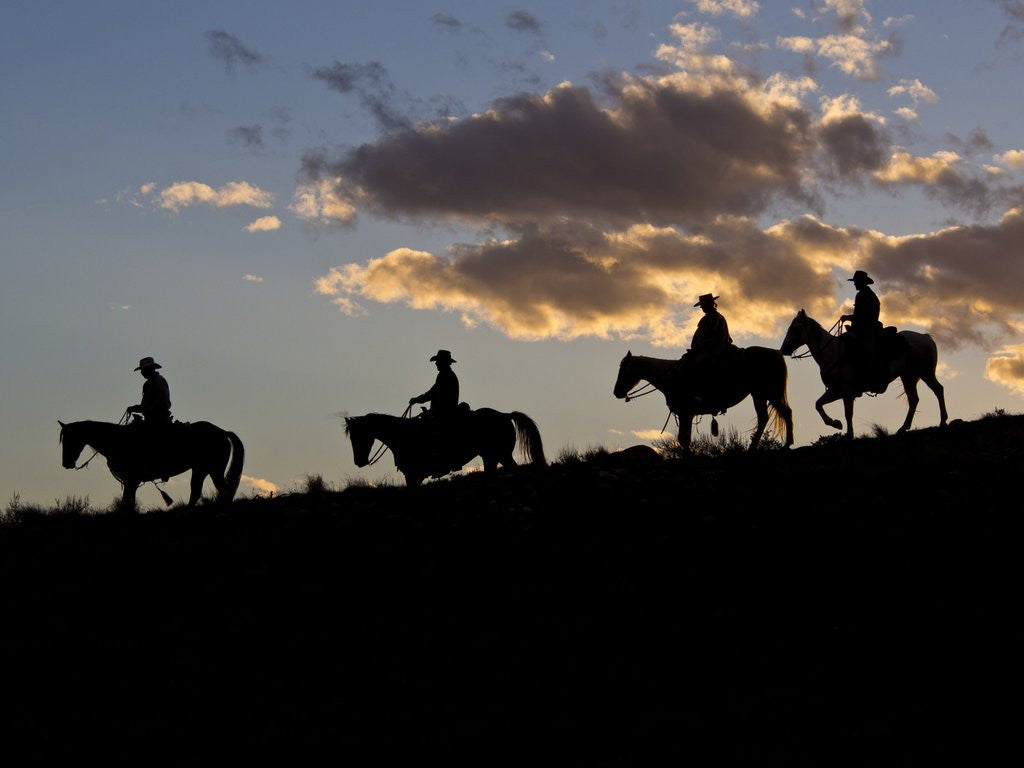 Detail of Cowboys in silhouette with sunset by Anonymous