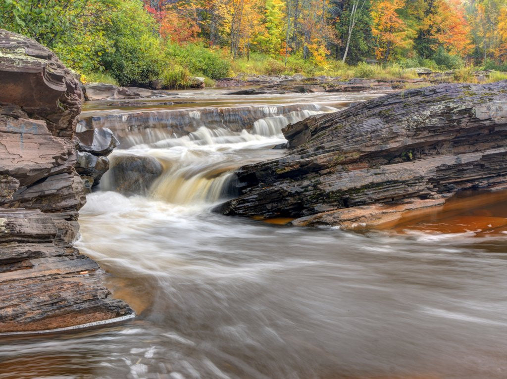 Detail of Bonanza Falls, where the Iron river glides over smooth slanted rocks. by Anonymous