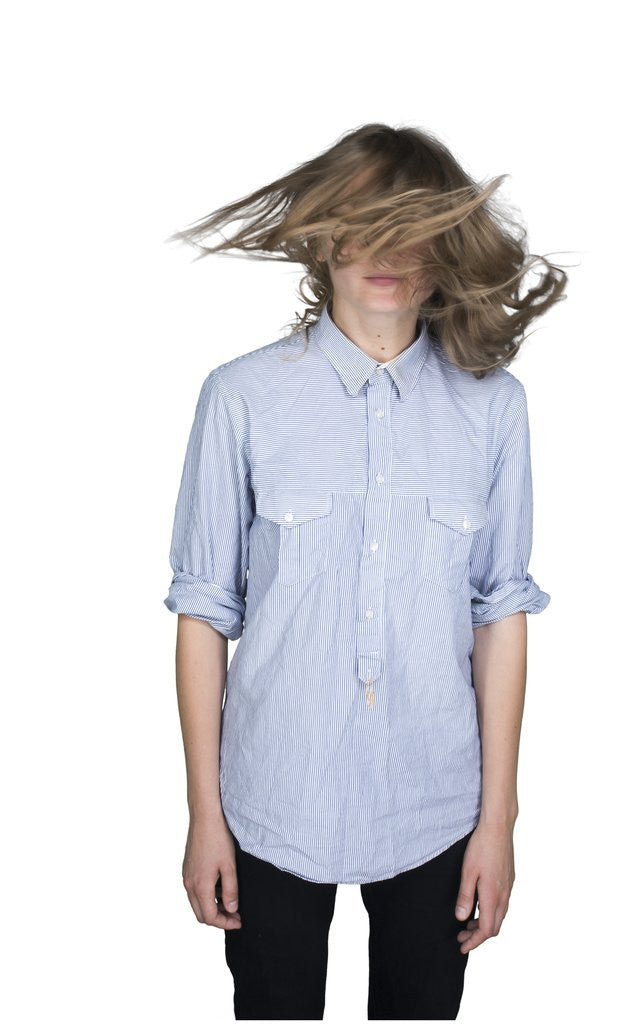 Detail of Teenage girl (16-17) shaking her head by Anonymous